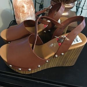 NEVER WORN!! New with tags!! Wedge heels